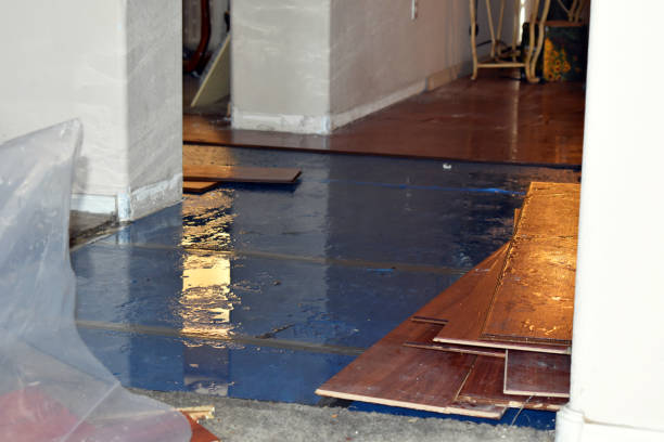 Professional Flood Damage Repair technician working in Fuquay-Varina, NC